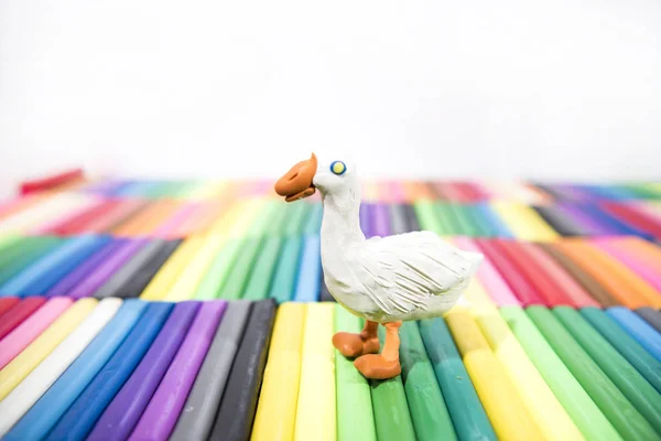 Play clay Animals. Goose on colored background. — Stock Photo, Image