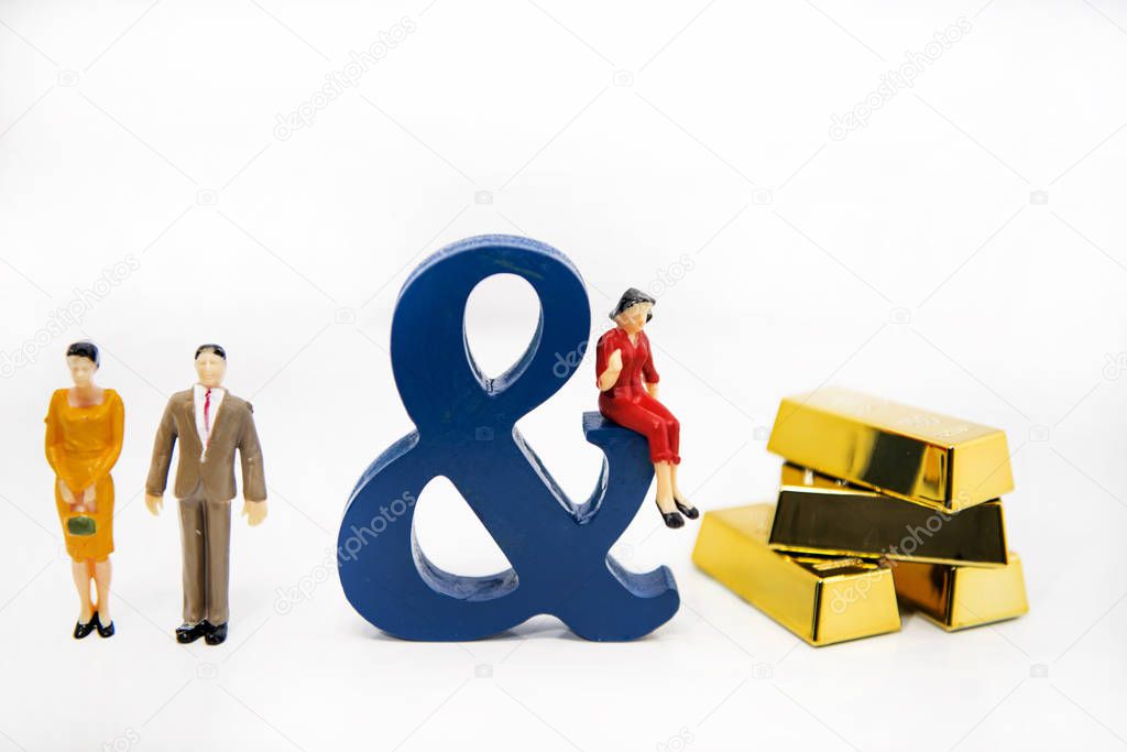 Love triangle. Abstract photo of love and lovers. Big wooden letters with small plastic people figures.