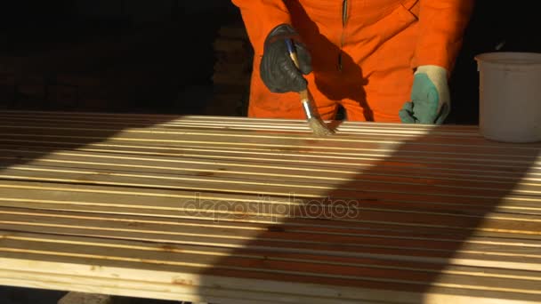 Lacquering horizontal flooring boards. — Stock Video