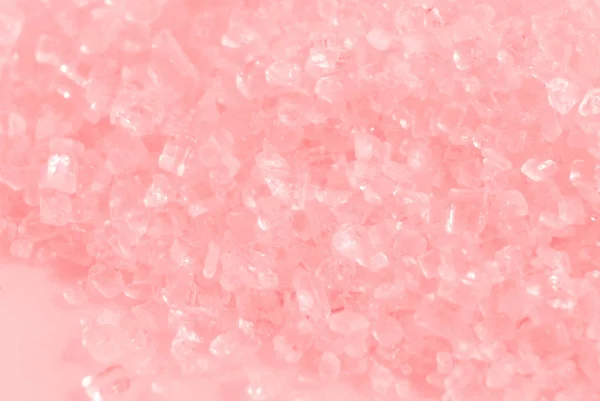 Yumuşak pastel pembe arka plan odaklı.