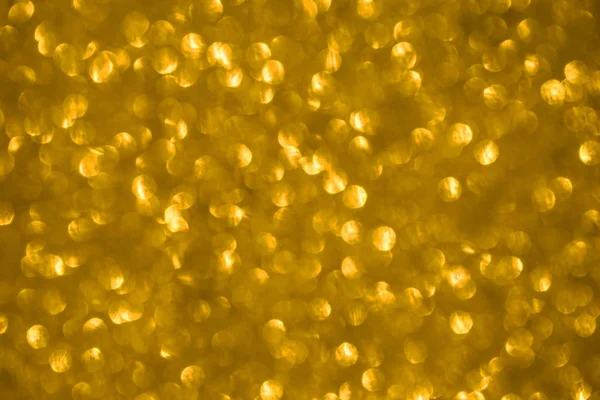 Gold sparkle abstract background with bokeh lights — Stock Photo, Image