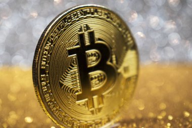 Altın bitcoin madeni para parlak ışıklar arka plan, kripto para birimi kavramı ile