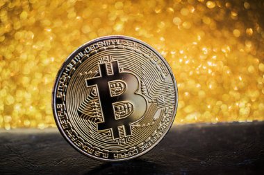 Altın bitcoin madeni para parlak ışıklar arka plan, kripto para birimi kavramı ile