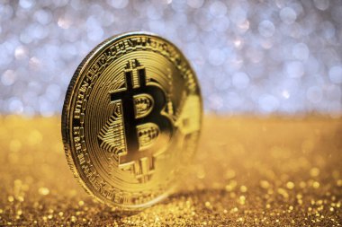 Altın bitcoin madeni para parlak ışıklar arka plan, kripto para birimi kavramı ile
