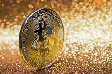 Altın bitcoin madeni para parlak ışıklar arka plan, kripto para birimi kavramı ile
