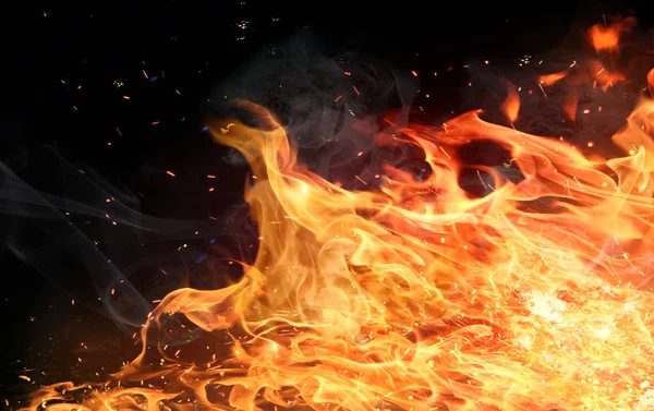Firestorm texture. Bokeh luci su sfondo nero, colpo di mosca — Foto Stock