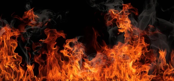 Die Textur des Feuers auf schwarzem Hintergrund spiegelt sich in einem Glossar wider — Stockfoto