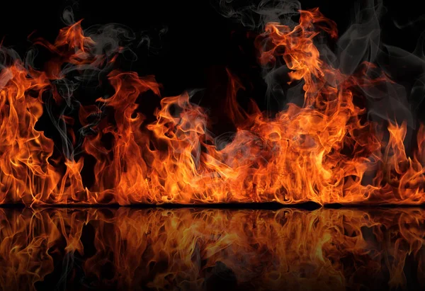Textuur van brand op een zwarte achtergrond. — Stockfoto