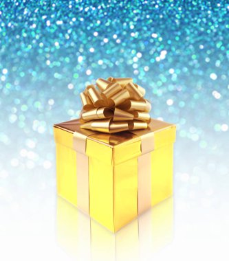 Altın hediye kutusu arka plan üzerinde.