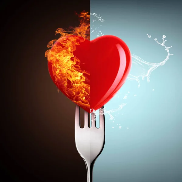 The burning heart on a fork. — Stock Photo, Image