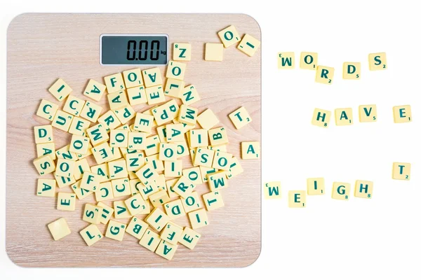 The Board Game having tiles with letters to form words and sentences