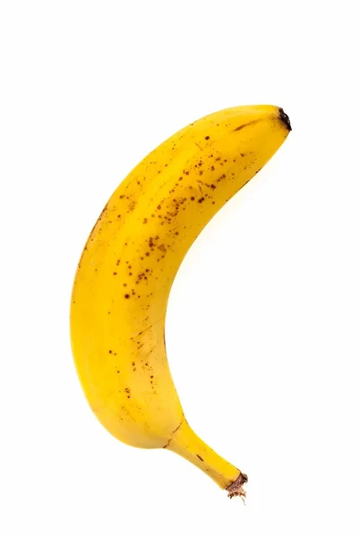 Uma banana madura isolada sobre fundo branco — Fotografia de Stock