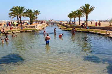 Thermal spring at Comarruga (Coma Ruga) beach. El Vendrell, Catalonia, Spain clipart