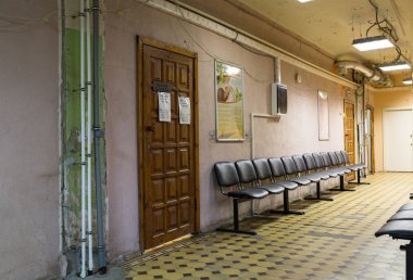 Interior of a corridor of the old municipal city hospital. City Balashikha, Moscow region, Russia. clipart