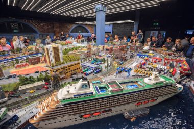 Interior of the exhibition Grand Maket Rossiya - the largest model layout in Russia, which shows the different landmarks of Russian Federation. Saint Petersburg, Russia clipart