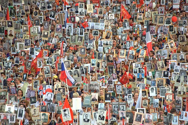 MOSCOW/ RUSSIA - MAY 9, 2016. The action "Immortal regiment" during the Victory parade: people holding portraits of the fallen soldiers. Celebration of the Victory in the Great Patriotic War.