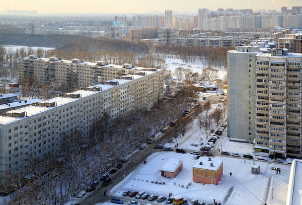 Aerial view of the residential neighborhood along the river in winter. Balashikha. Moscow region, Russia.