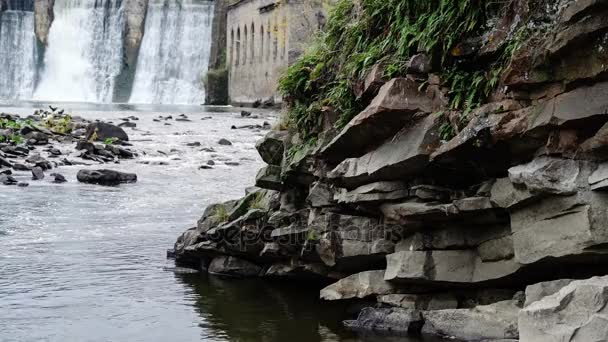 Waterfall in the autumn forest. Old micro hydro power plant. — Stock Video