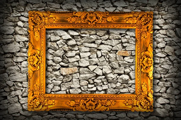 picture frame on wall of stones as a texture