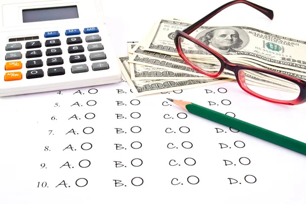 The test list ,pencil, glasses,  US Dollars and  Calculator  on — Stock Photo, Image