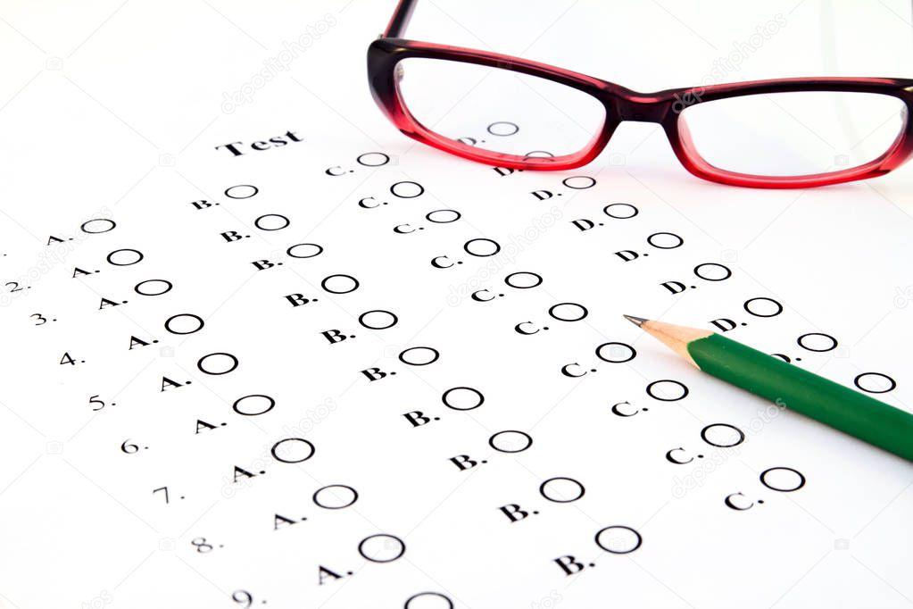 The test list and pencil and glasses  on the examination 