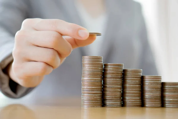 Close-up Of A Businesswoman Making Stack Of Coins — Stock Photo, Image