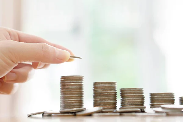 Saving money concept,Male hand putting money coin stack growing — Stock Photo, Image