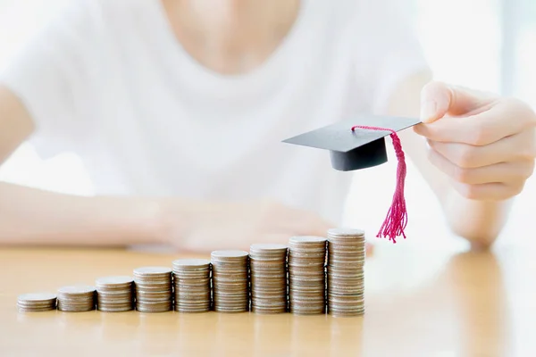 Woman saving education coins — Stock Photo, Image