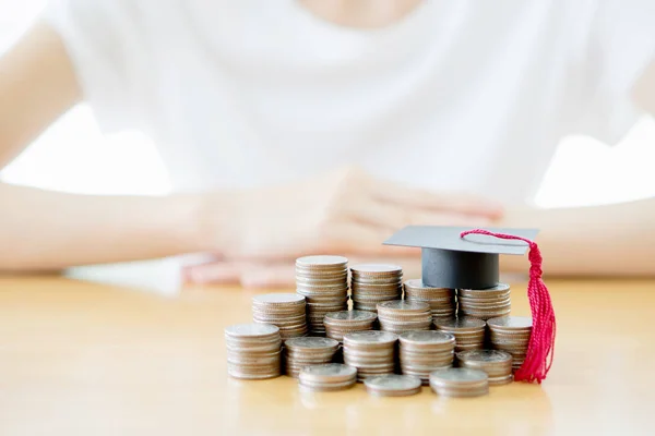Woman saving education coins — Stock Photo, Image