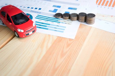 Para, grafik ve kırmızı araba