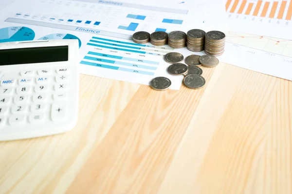 Business concept with calculator and coins — Stock Photo, Image