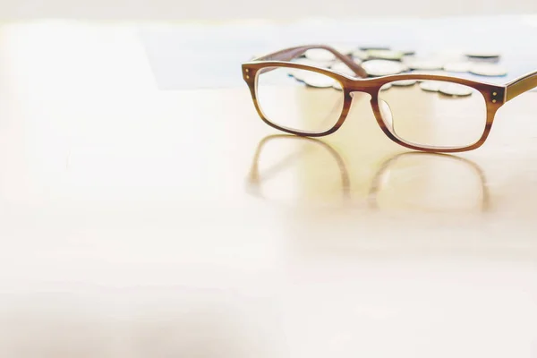 Glasses coin on table — Stock Photo, Image