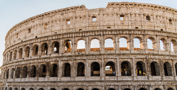 Ancient Roman Colosseum at sunrise. Rome, Italy