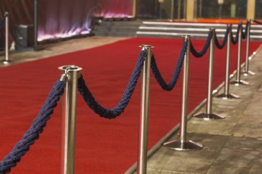  red carpet between rope barriers clipart