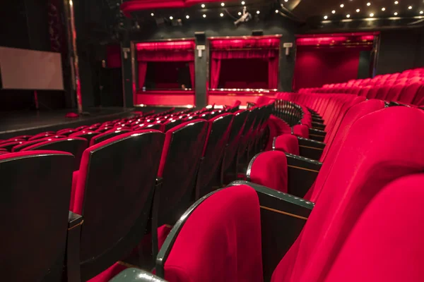 Red seats in a empty theater and opera.