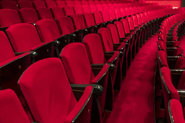 Red seats in a empty theater and opera.