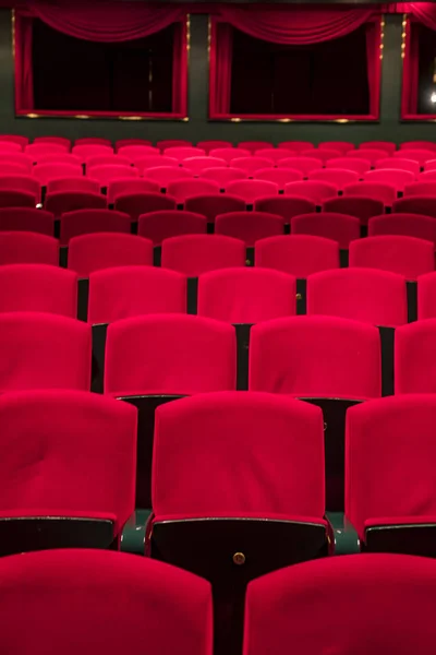 Red seats in a empty theater and opera.