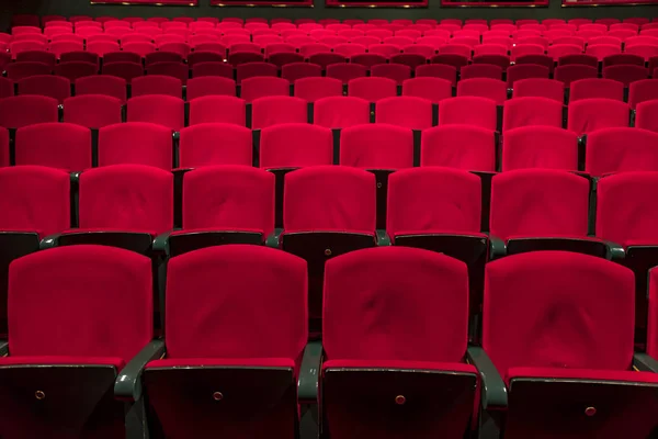 Red seats in a empty theater and opera.