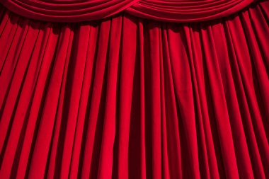 Kırmızı perde tiyatro arka plan ile kıvrımlar, gölgeler ve zirveler.