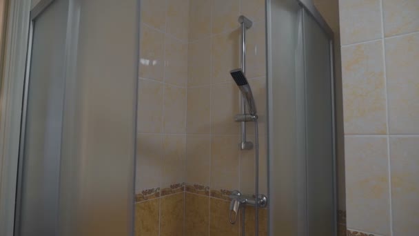 Standard shower stall, handy for showering after a hard days work. Place for relaxation. Camera moves. — Stock Video