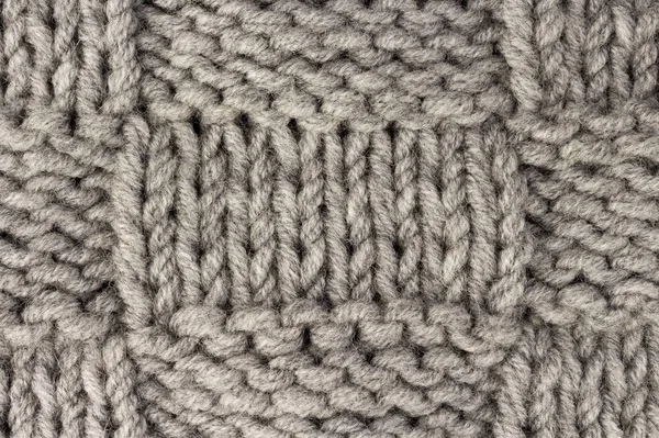 Tricotar. Fundo de textura de tecido de malha cinza ou fundo de padrão de malha — Fotografia de Stock