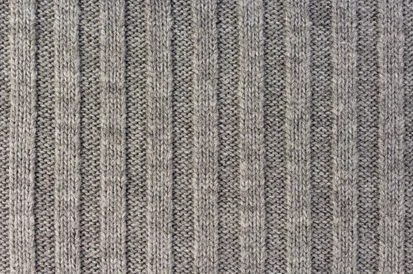 Tricotar. Textura de tecido de malha cinza listrado vertical, fundo de padrão de malha — Fotografia de Stock