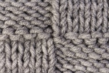 Örgü. Gri örgü desen arka plan veya örme kumaş doku arka plan