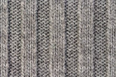 Örgü. Dikey çizgili gri örgü kumaş doku, desen arka plan örme