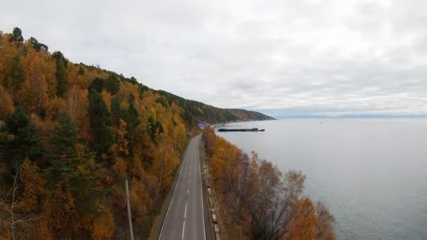 Aerial shot of coastal road — Stok video