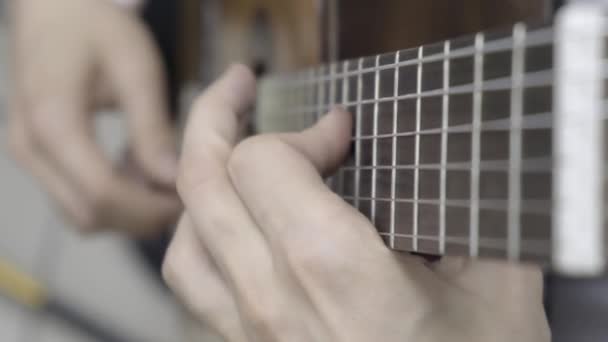 Playing guitar. Slow motion — Stock Video
