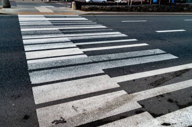 Crosswalk in the form of piano keys. Abstract musical background. Piano shaped lines. an interesting way of embellishing roads and getting people to be careful.