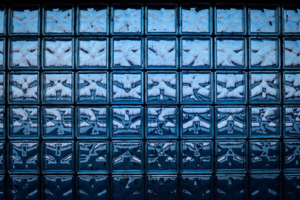 blue glass brick wall - seamless texture. color abstraction in brick glass wall.