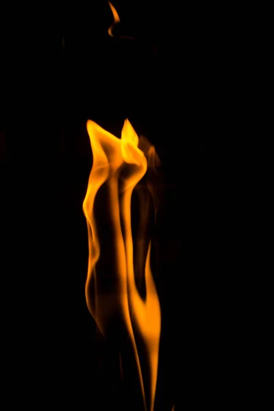 Dancing flame on the black background — Stock Photo, Image