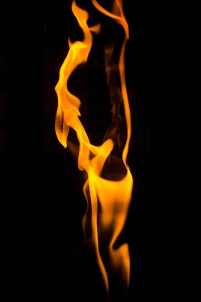 Dancing flame, a fekete háttér — Stock Fotó